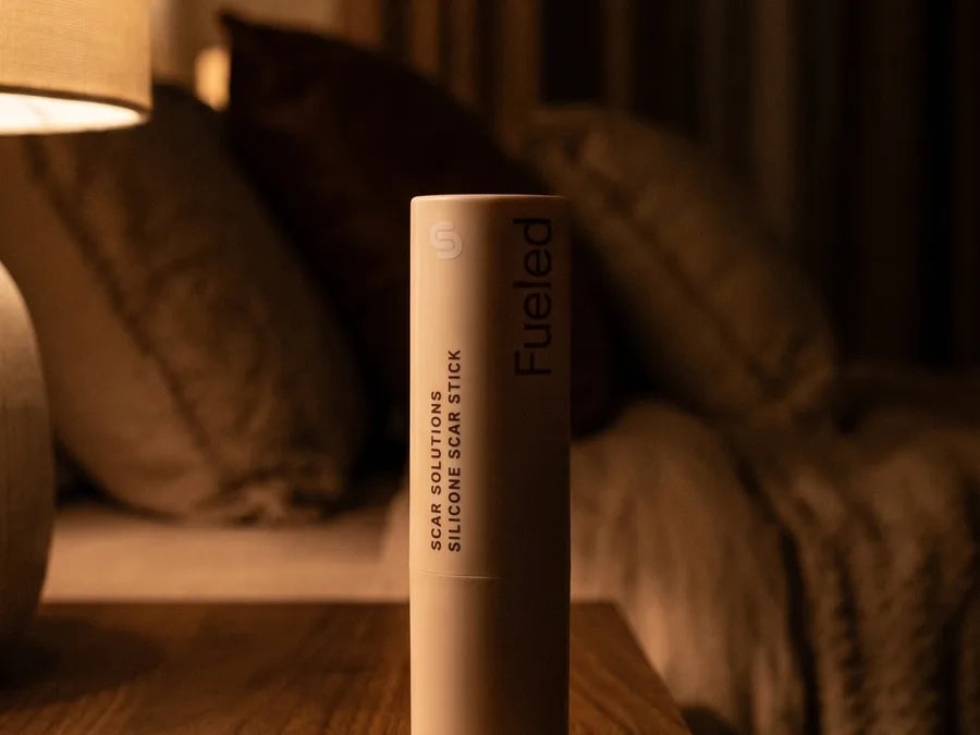 The stick on a nightstand.